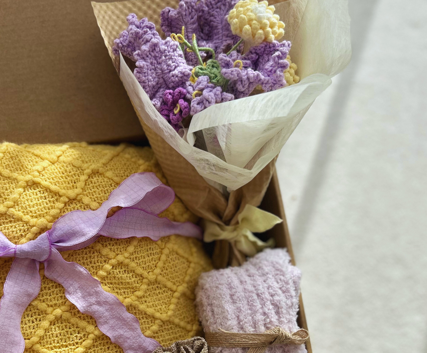 Sunshine & Lavender Joy Gift Box: Yellow Knit Blanket, Purple Crochet Bouquet & Cozy Socks Basketful Gifts