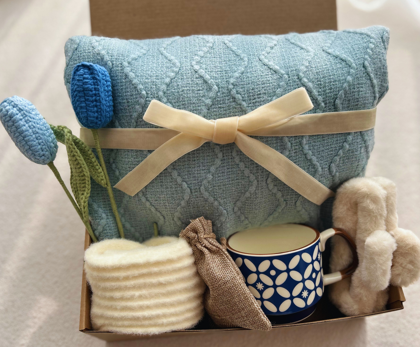 Blue Care Package for Her with Cozy Blanket and Blue Crochet Tulips Basketful Gifts