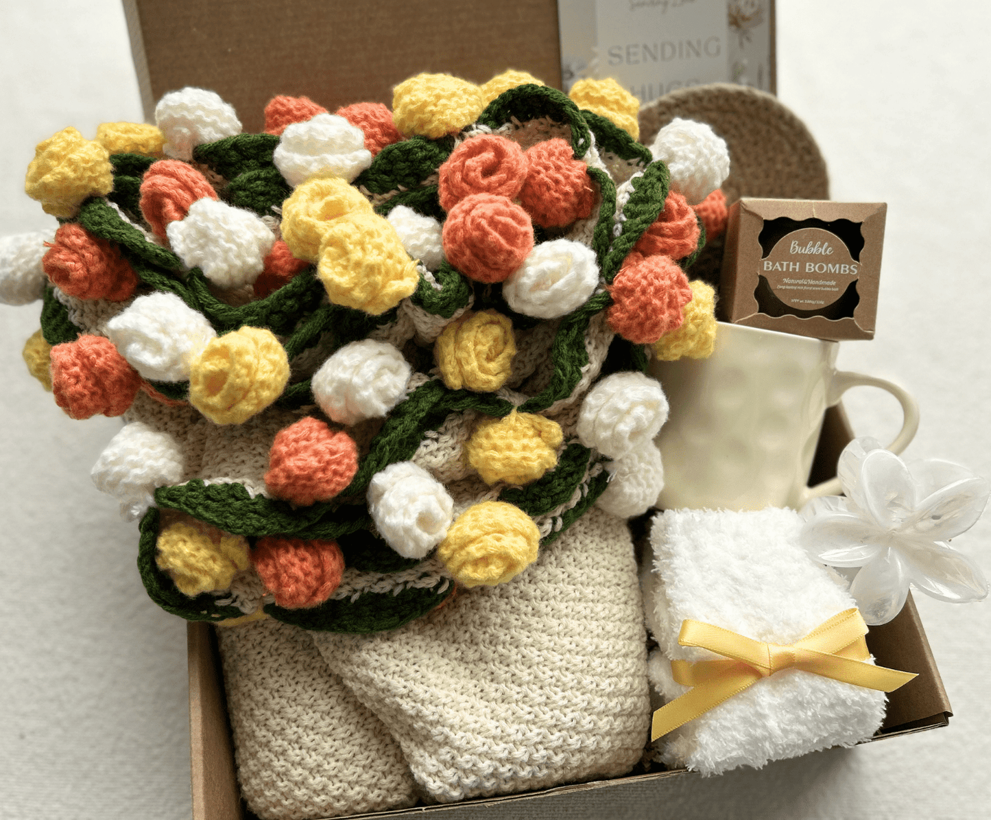 Thinking of You gift basket with handmade crochet flower bouquet, ceramic mug, bath bombs and cozy socks - Basketful Gifts
